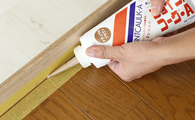 Pour caulk in.